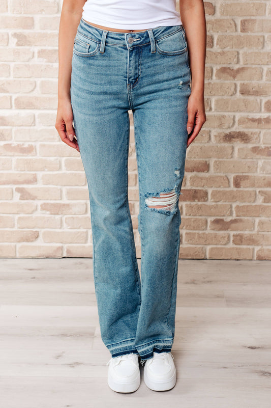 Judy Blue Mid Rise Distressed Released Hem Bootcut Jeans: 5/27